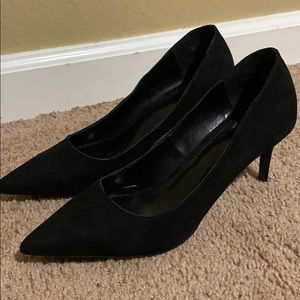 Pointy black heels
